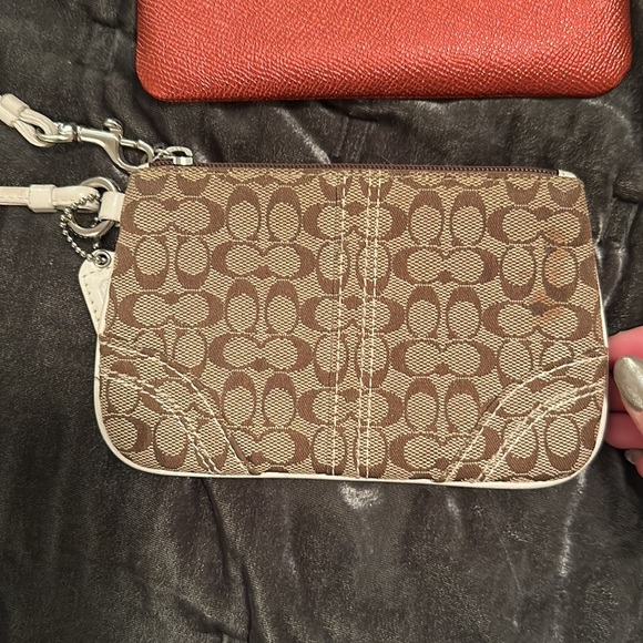 NWT (2) Brand new never used coach wristlet and a like new wristlet BOTH BAGS - Picture 8 of 8